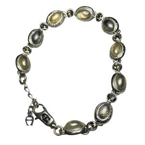 Etienne Aigner Silver Tone Bracelet in Cream and Silver Tone